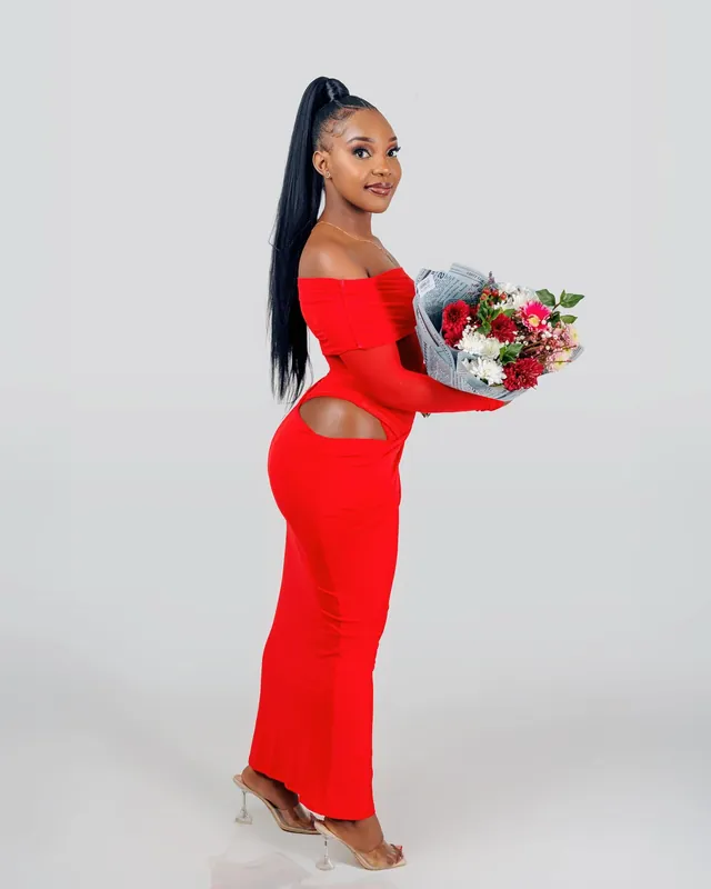 Portrait with flower bouquet, off-shoulder dress